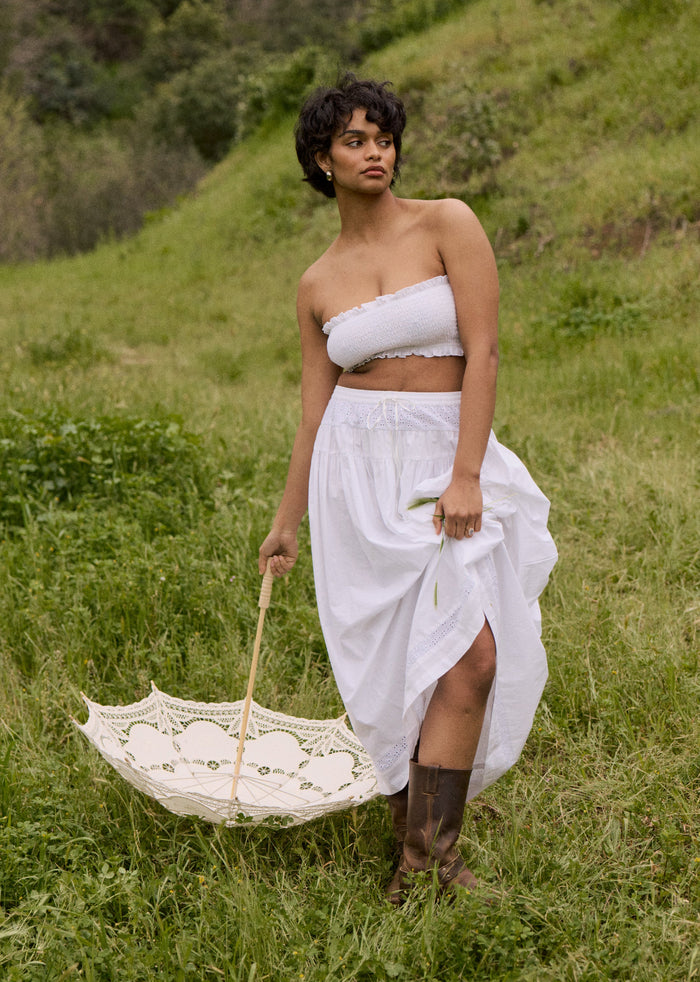 This is an image of Lyssa Set in White Eyelet - RESA featuring a model wearing the dress
