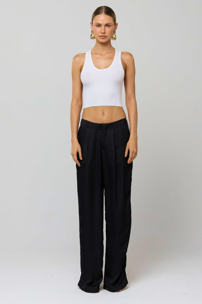 This is an image of Malcolm Trousers in Stripe - RESA featuring a model wearing the dress