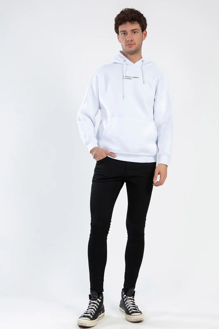 Model wearing Mark Black Super Skinny Trendy Denim jeans with a white hoodie and high-top sneakers.