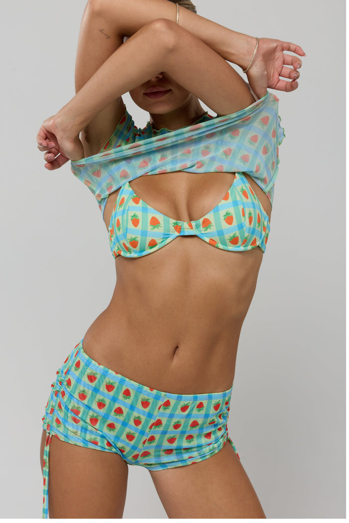 This is an image of Matty Bikini Top in Juicy - RESA featuring a model wearing the dress