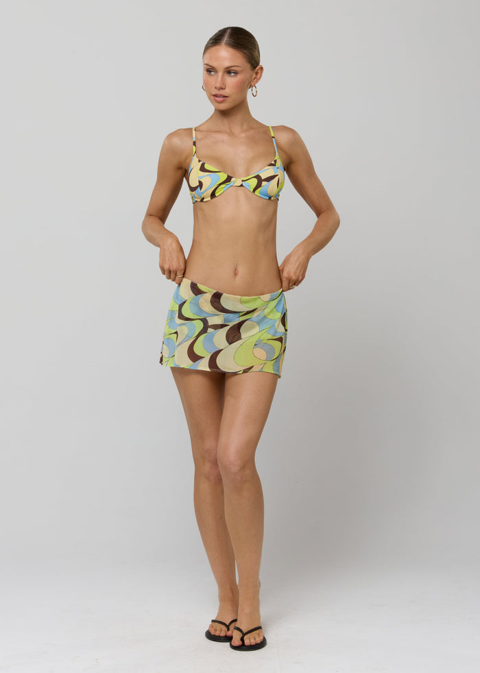 This is an image of Matty Bikini Top in Palm Royale - RESA featuring a model wearing the dress