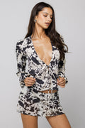 This is an image of Meg Blouse in Hide - RESA featuring a model wearing the dress