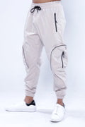 Melvin Stone Cargo Pants in a slim fit streetwear style with utility zip pockets and drawstring waistband.