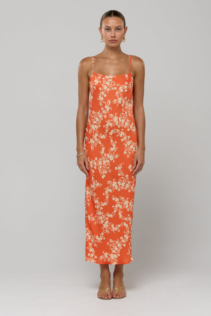 This is an image of Meryl in Orange Blossom - RESA featuring a model wearing the dress