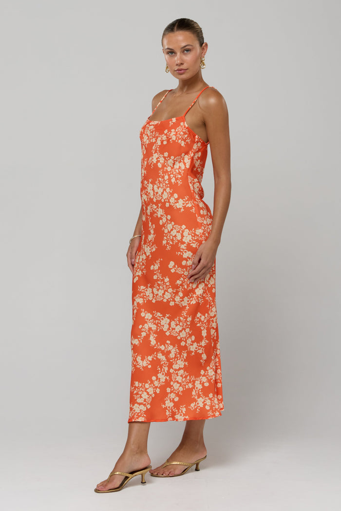 This is an image of Meryl in Orange Blossom - RESA featuring a model wearing the dress