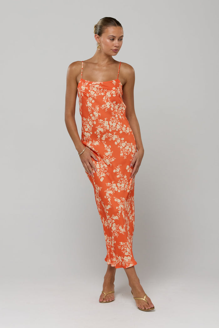 This is an image of Meryl in Orange Blossom - RESA featuring a model wearing the dress