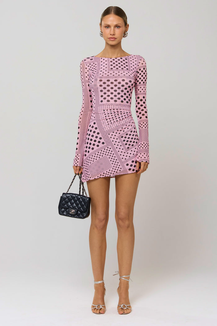 This is an image of Mia Mini Dress in Lauper - RESA featuring a model wearing the dress