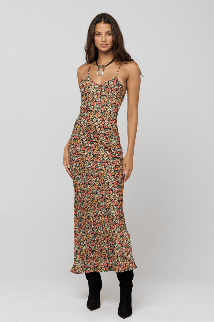 This is an image of Micah Dress in Fig - RESA featuring a model wearing the dress