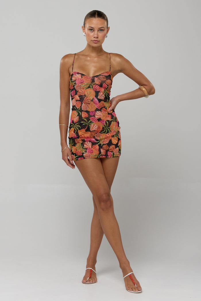 This is an image of Micro Mini dress in Conch - RESA featuring a model wearing the dress