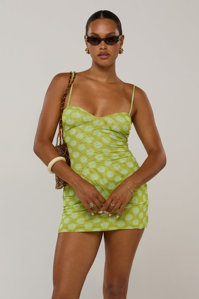 This is an image of Micro Mini in Luma - RESA featuring a model wearing the dress