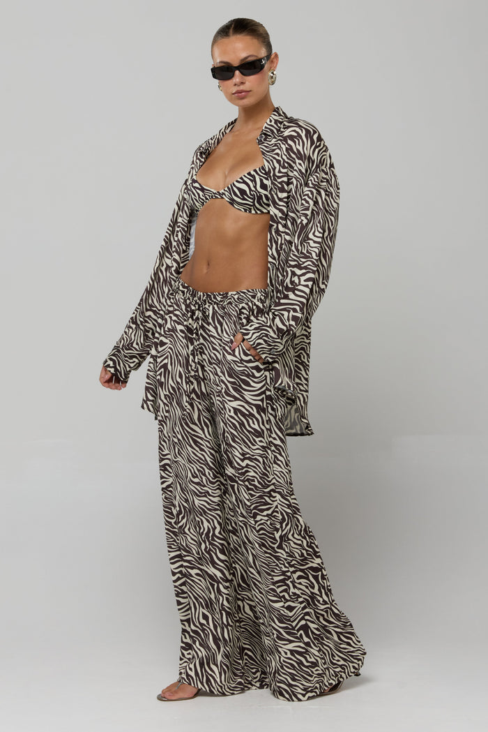 This is an image of Miley Set in Selva - RESA featuring a model wearing the dress