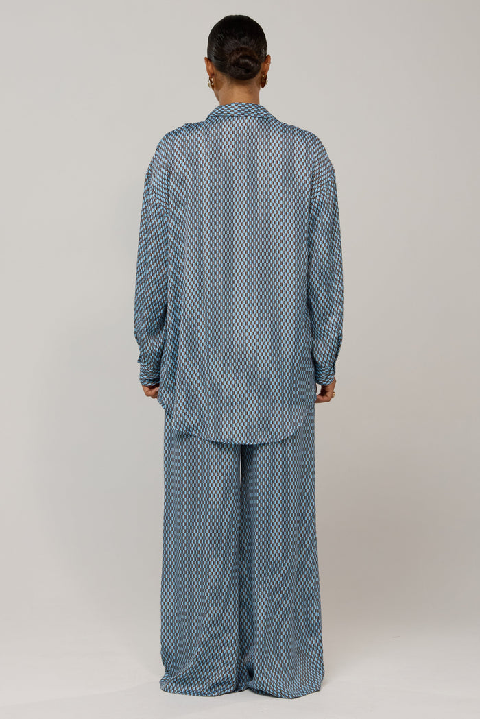 This is an image of Miley in Swell - RESA featuring a model wearing the dress