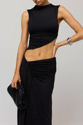 This is an image of Minka Top in Black Knit - RESA featuring a model wearing the dress