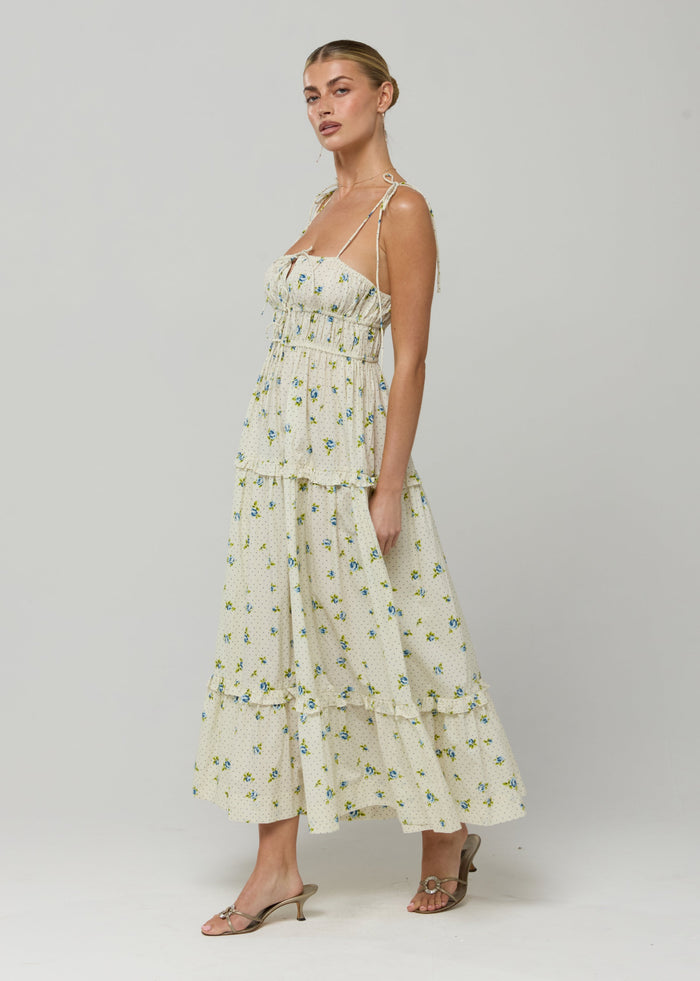 This is an image of Olivia Dress in Cotton Bluebell - RESA featuring a model wearing the dress