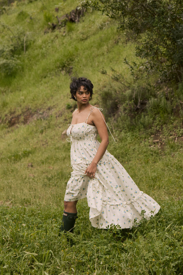 This is an image of Olivia Dress in Cotton Bluebell - RESA featuring a model wearing the dress