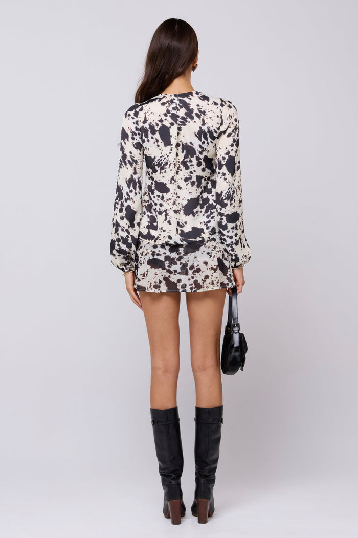 This is an image of Paola Skort in Hide - RESA featuring a model wearing the dress
