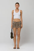 This is an image of Paola Skort in Serpent - RESA featuring a model wearing the dress