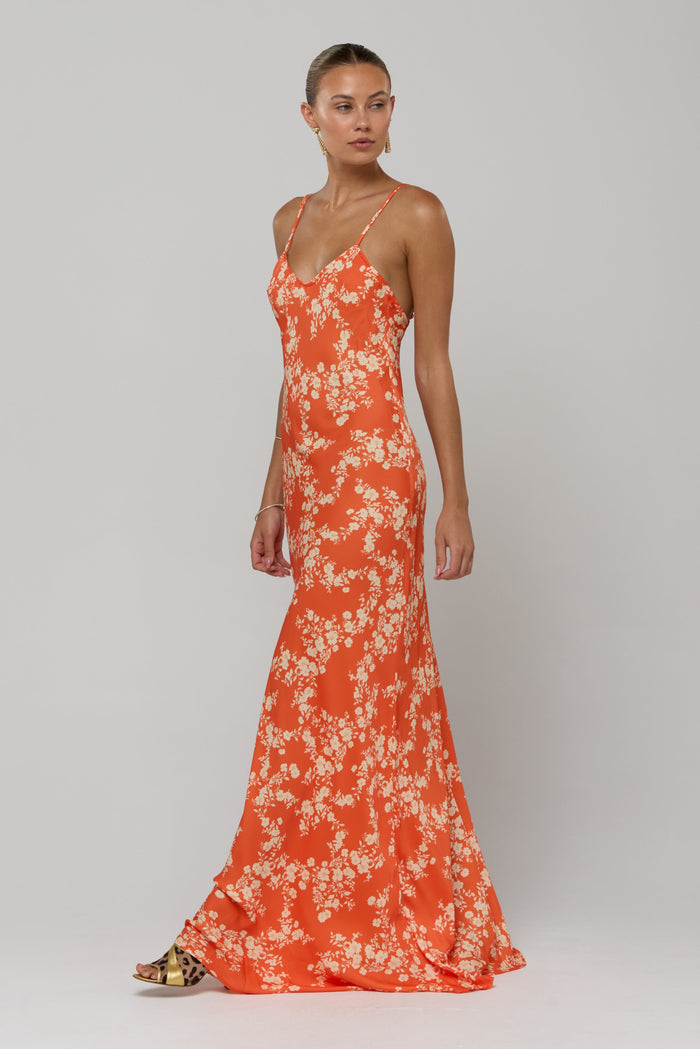 This is an image of Rose Maxi in Orange Blossom - RESA featuring a model wearing the dress