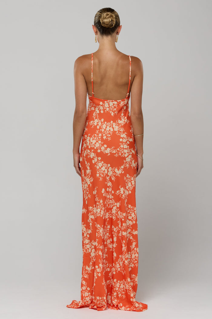 This is an image of Rose Maxi in Orange Blossom - RESA featuring a model wearing the dress
