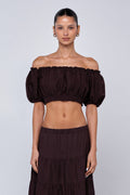 This is an image of Saige Top in Brown Linen - RESA featuring a model wearing the dress