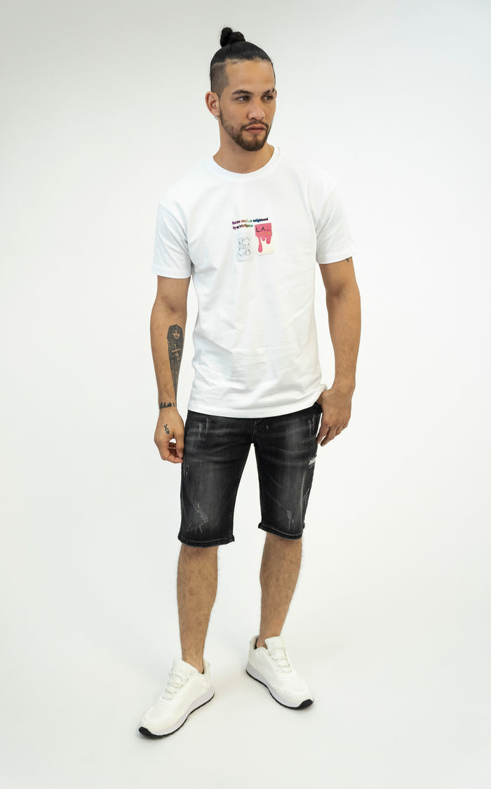 Model wearing Samuel Black Washed Denim Shorts by Carbon Jeans, featuring distressed details and a streetwear fit.
