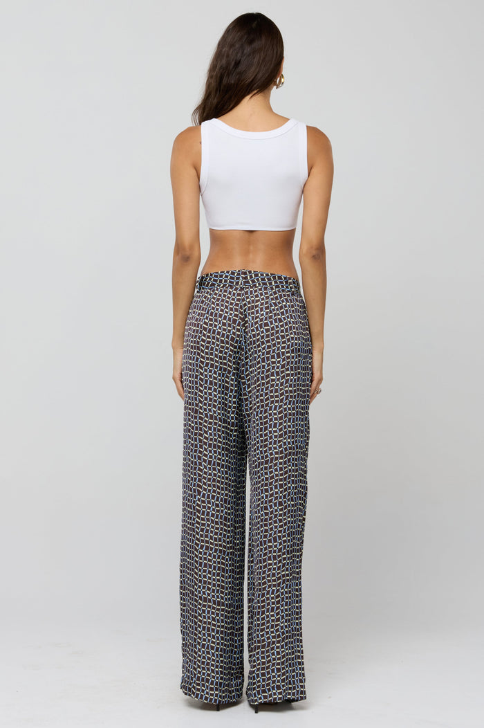 This is an image of Sasha Trouser in Tide - RESA featuring a model wearing the dress