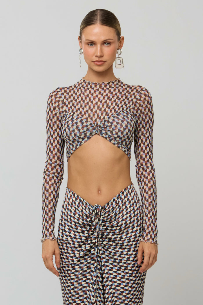 This is an image of Shelby Top in Mosiac - RESA featuring a model wearing the dress