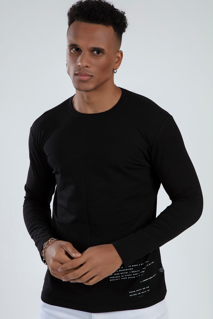 Men's Carbon Jeans Show Must Go On black long sleeve graphic tee with white text detail at the hem.