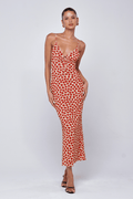 This is an image of Suki Dress in Campari - RESA featuring a model wearing the dress