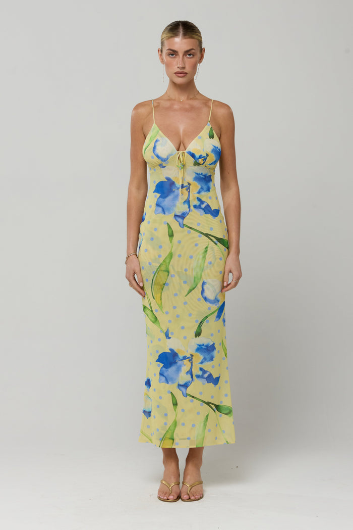 This is an image of Suki Dress in Solei - RESA featuring a model wearing the dress