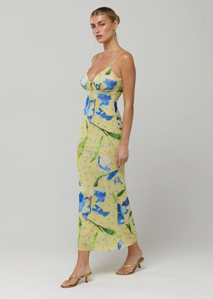 This is an image of Suki Dress in Solei - RESA featuring a model wearing the dress