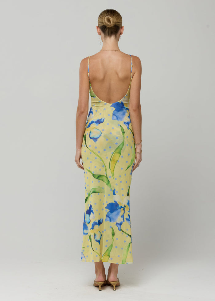 This is an image of Suki Dress in Solei - RESA featuring a model wearing the dress
