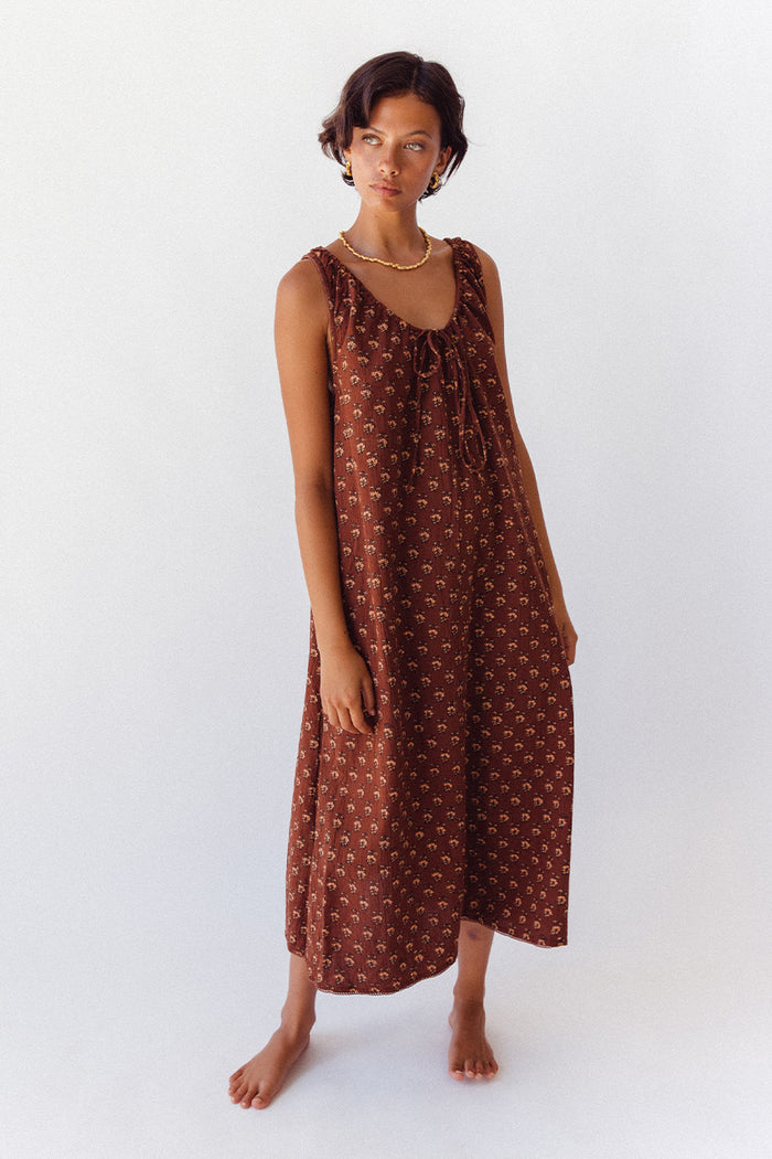 Sundress Midi Almond — upper body studio portrait, model showcasing dress neckline and shoulder detail, hand block print warm almond cotton, sustainable Indian women's fashion | Daughters of India