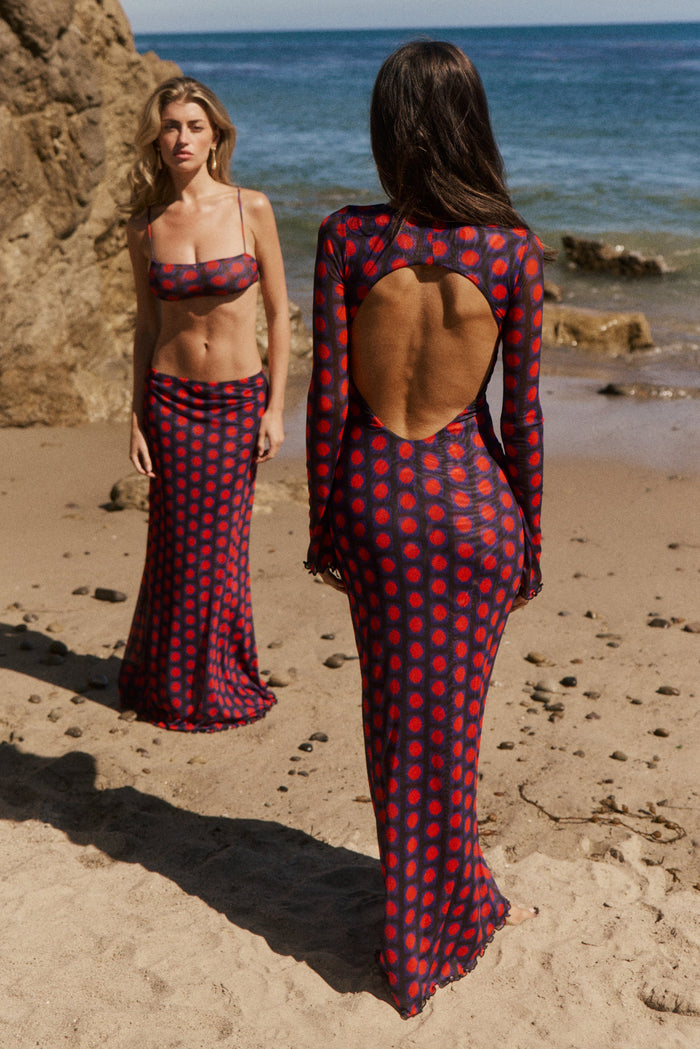 This is an image of Sylvia Dress in Mod - RESA featuring a model wearing the dress