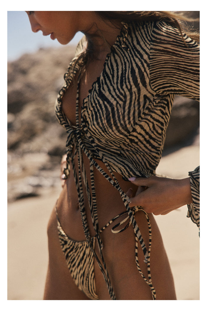 This is an image of Tezza Top in Birch - RESA featuring a model wearing the dress
