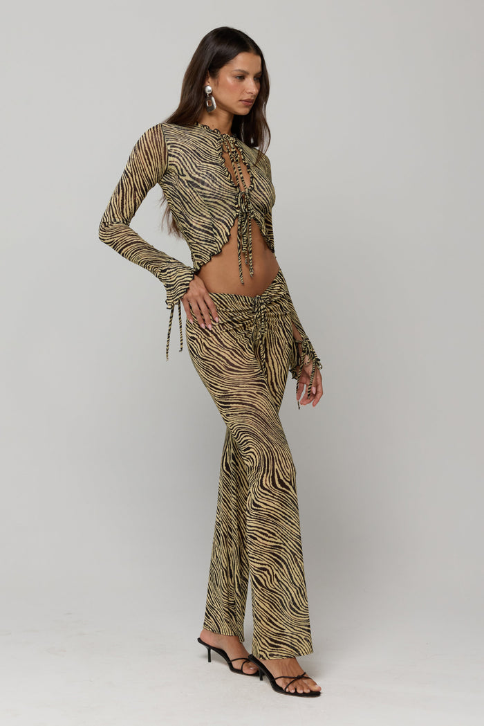 This is an image of Tezza Top in Birch - RESA featuring a model wearing the dress