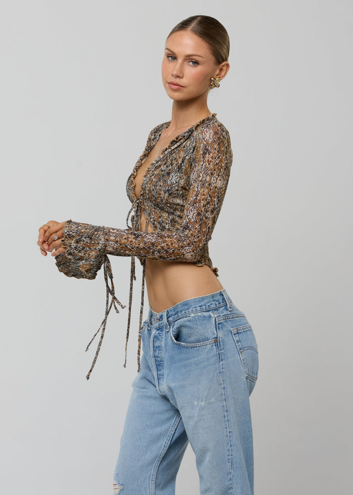 This is an image of Tezza Top in Serpent - RESA featuring a model wearing the dress