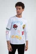 Man wearing the Untimely white long-sleeve shirt with colorful pixel art graphics and puff print streetwear designs.
