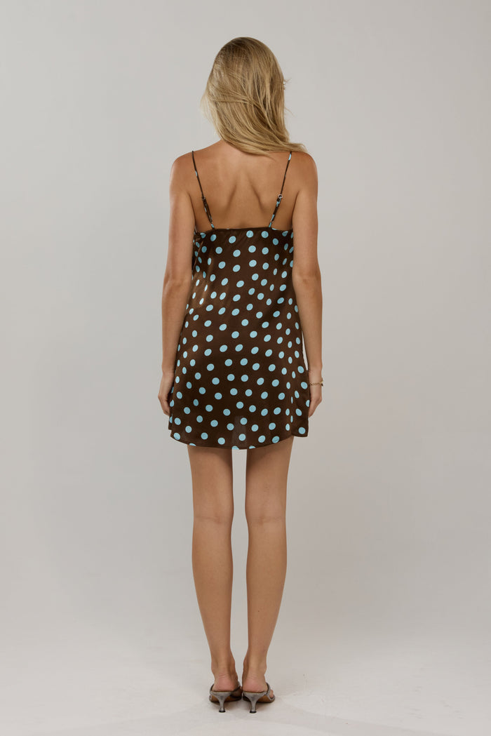 This is an image of Vivi in Costa - RESA featuring a model wearing the dress