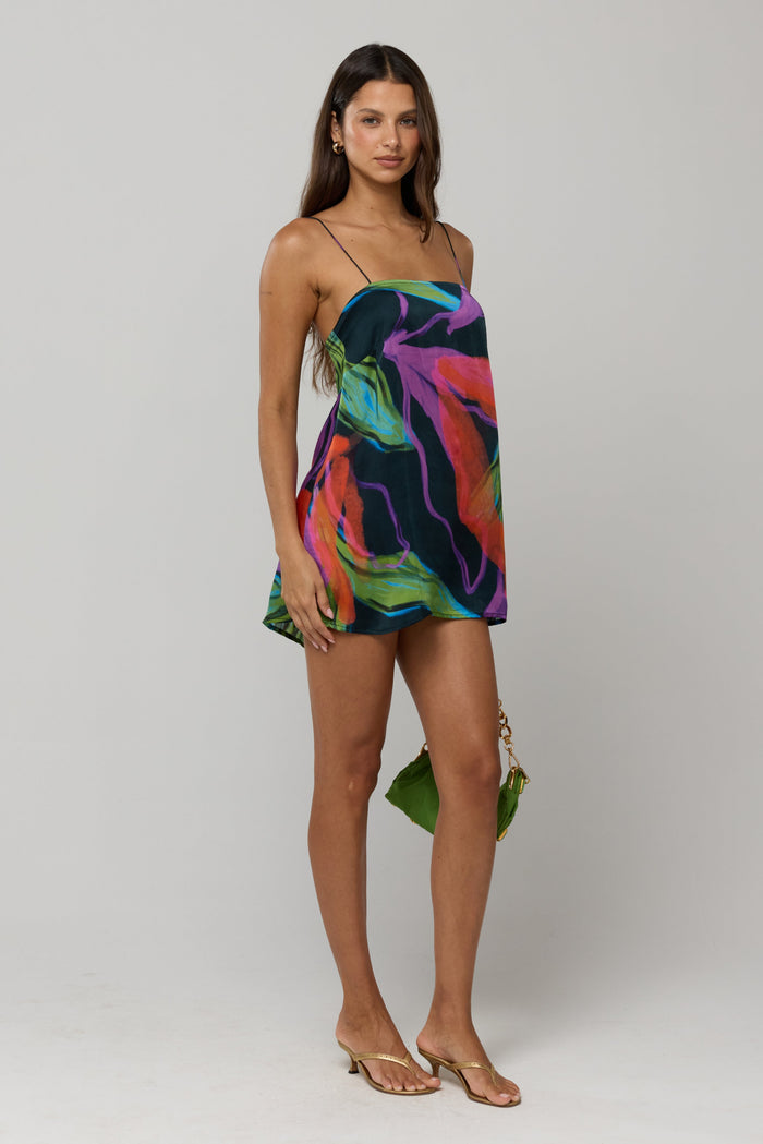 This is an image of Vivi Dress in Mai Tai - RESA featuring a model wearing the dress