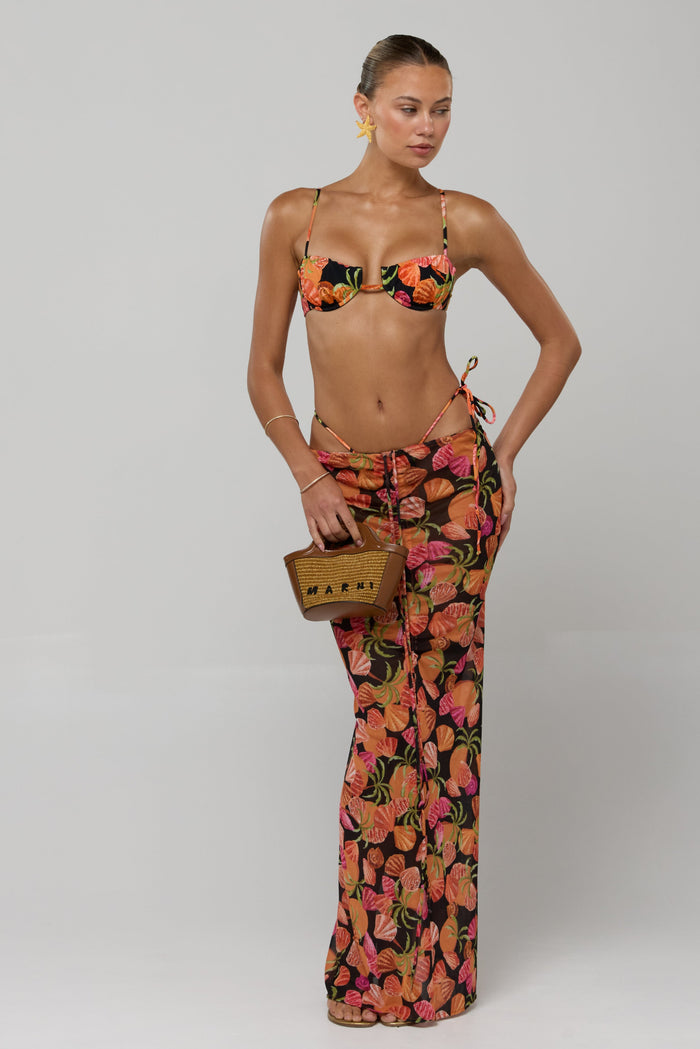 This is an image of Ziggy Mesh Skirt in Conch - RESA featuring a model wearing the dress